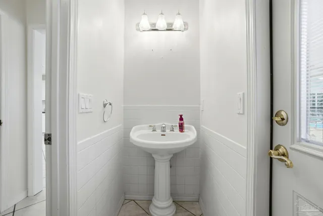 a bathroom with a toilet and a sink