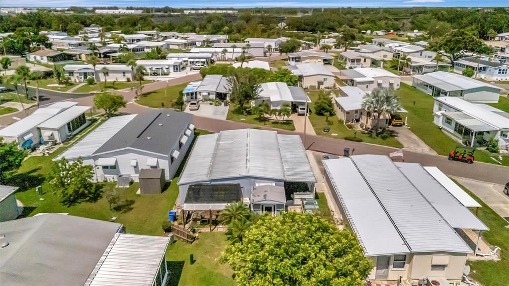 124 St Pierres Way Apollo Beach, FL 33572 - Photo 32 of 56 an aerial view of residential houses with outdoor space