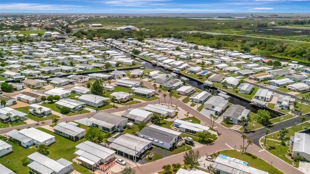 124 St Pierres Way Apollo Beach, FL 33572 - Photo 38 of 56 an aerial view of residential houses with outdoor space