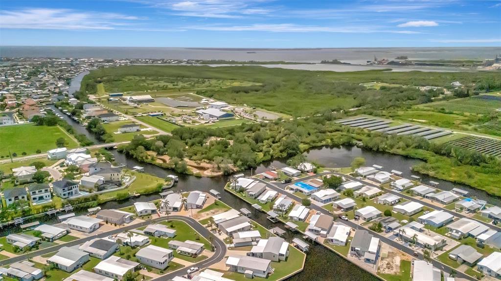 124 St Pierres Way Apollo Beach, FL 33572 - Photo 47 of 56 a view of a city with an ocean