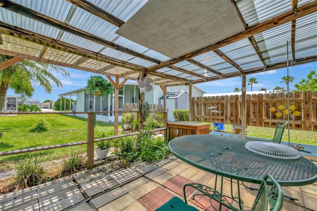 124 St Pierres Way Apollo Beach, FL 33572 - Photo 53 of 56 a view of a swimming pool with a patio and a backyard
