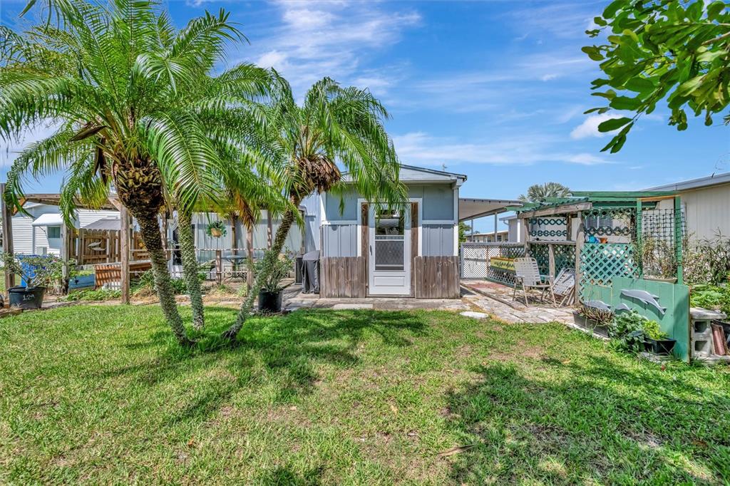 124 St Pierres Way Apollo Beach, FL 33572 - Photo 6 of 56 a view of a house with a yard