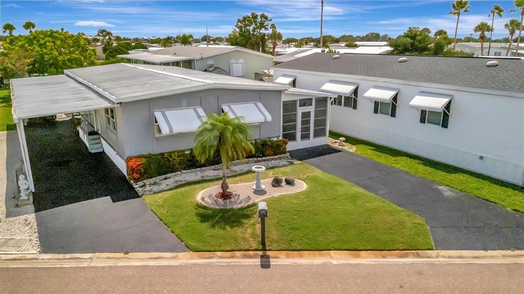 124 St Pierres Way Apollo Beach, FL 33572 - Photo 7 of 56 an aerial view of a house having patio