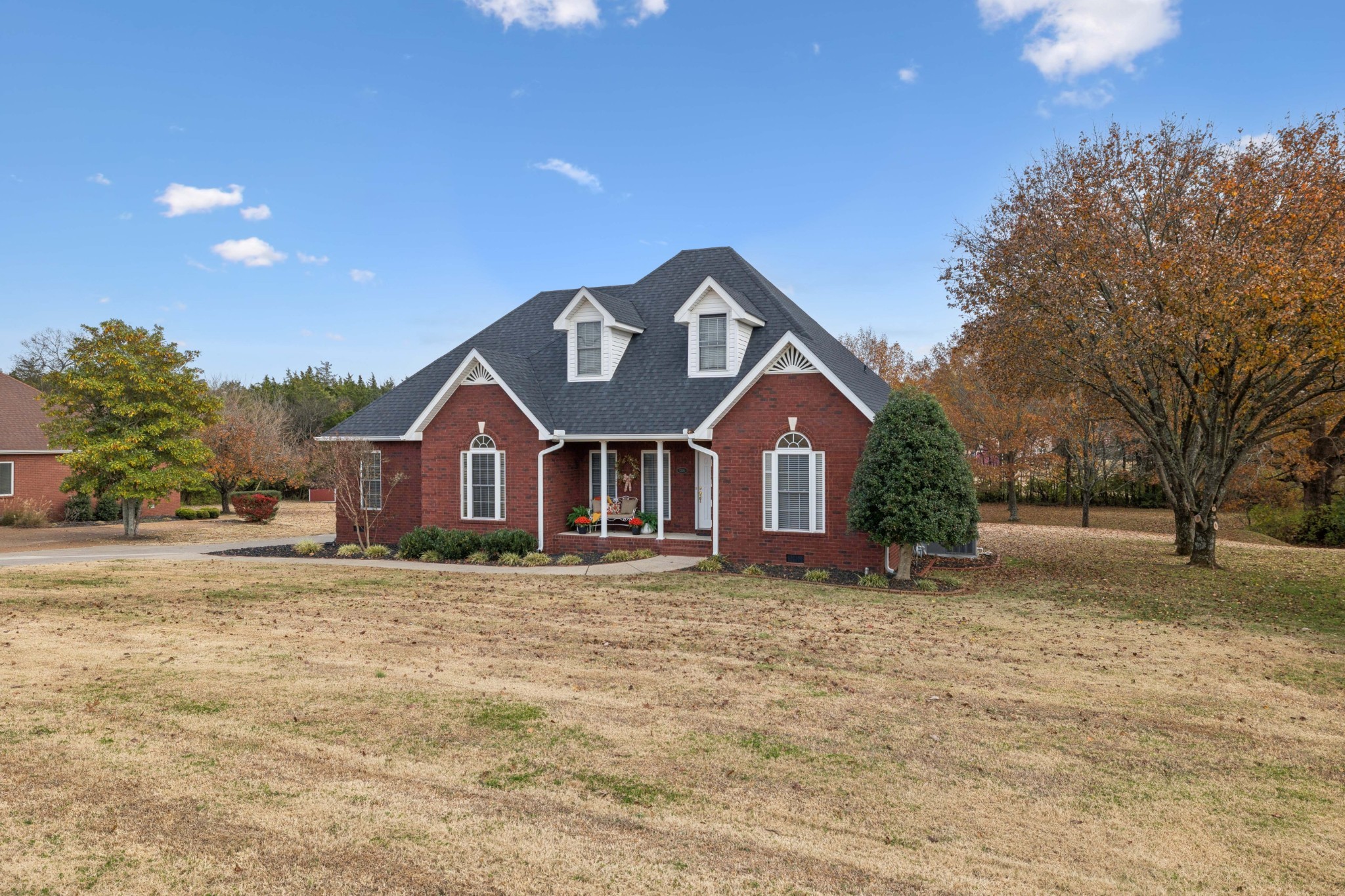 1205 Rock Springs Road Smyrna, TN 37167 - Photo 1 of 48 a front view of a house with a yard