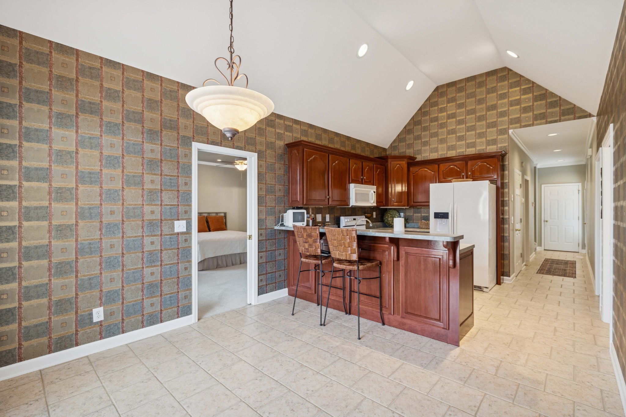 1205 Rock Springs Road Smyrna, TN 37167 - Photo 13 of 48 a view of living room kitchen with stainless steel appliances granite countertop cabinets and fireplace