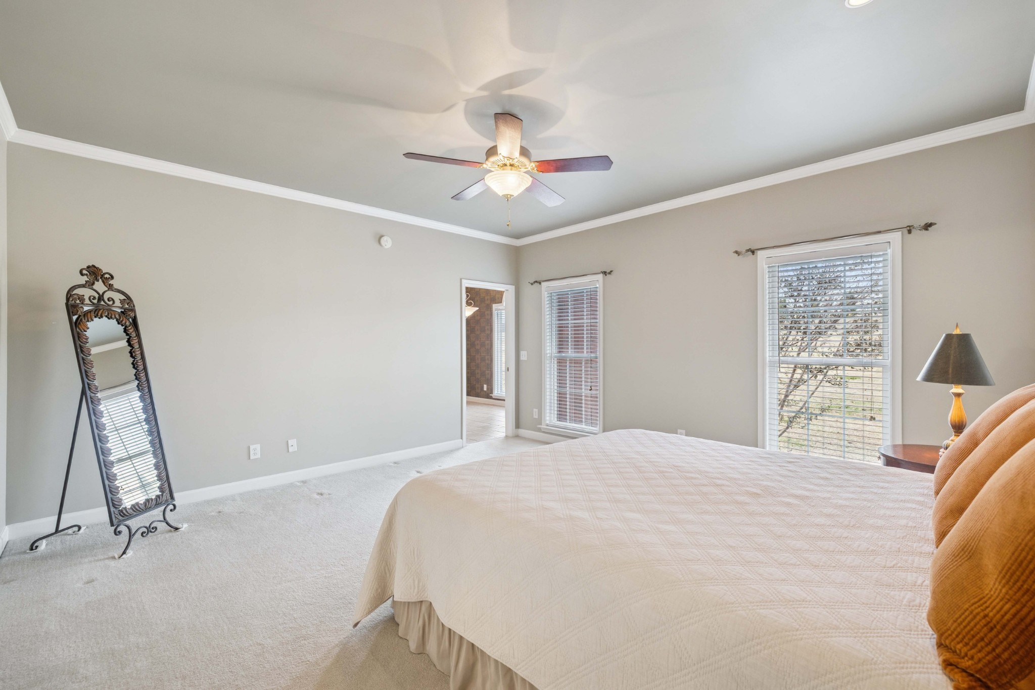 1205 Rock Springs Road Smyrna, TN 37167 - Photo 17 of 48 a bedroom with a bed and a chandelier