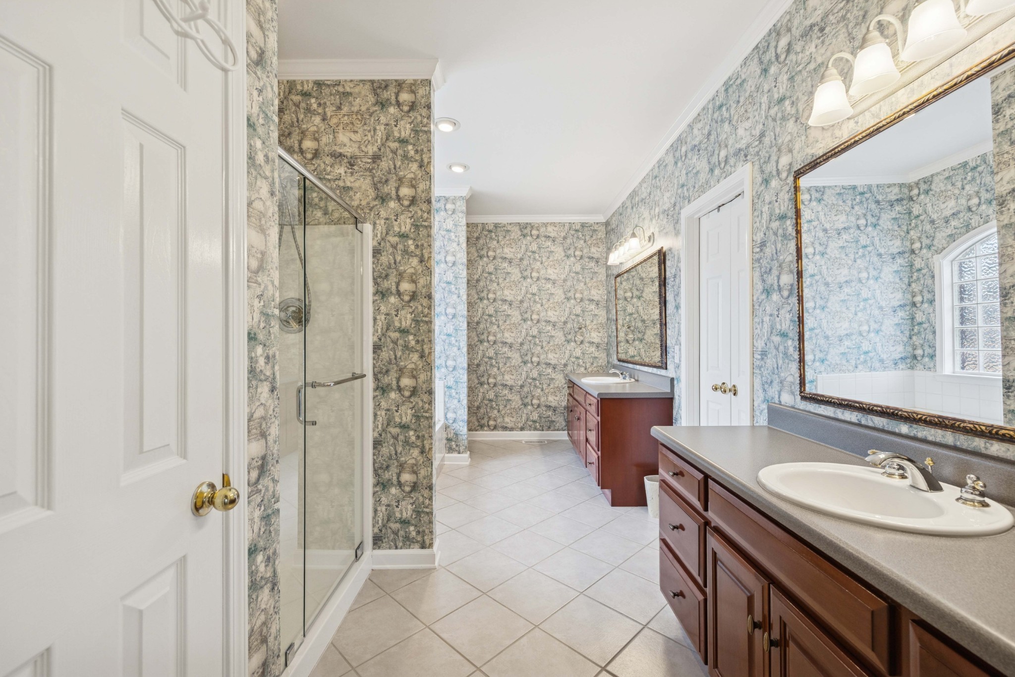 1205 Rock Springs Road Smyrna, TN 37167 - Photo 18 of 48 a spacious bathroom with a granite countertop sink a toilet a mirror and a tub