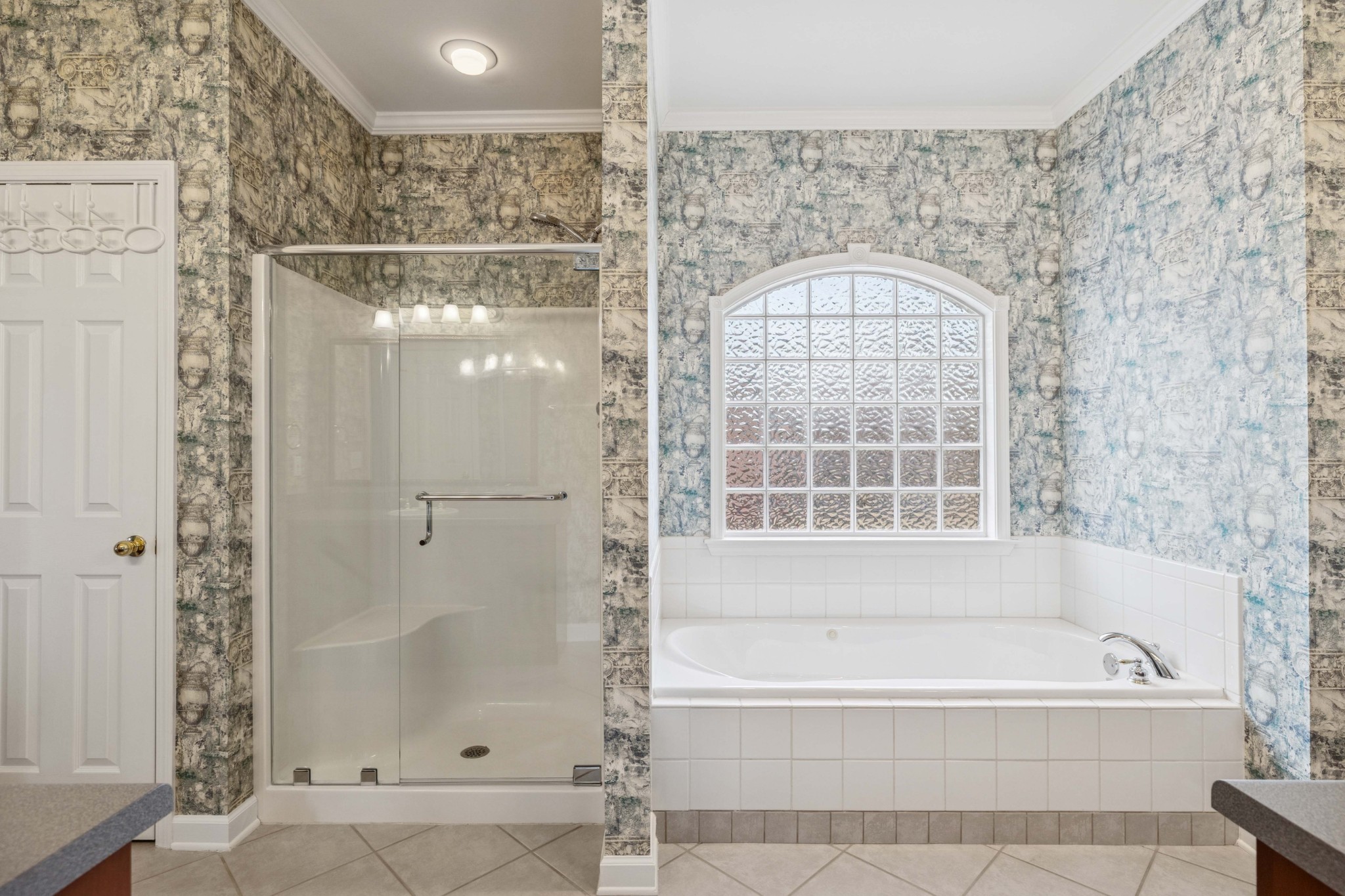 1205 Rock Springs Road Smyrna, TN 37167 - Photo 19 of 48 a bathroom with a bathtub and shower