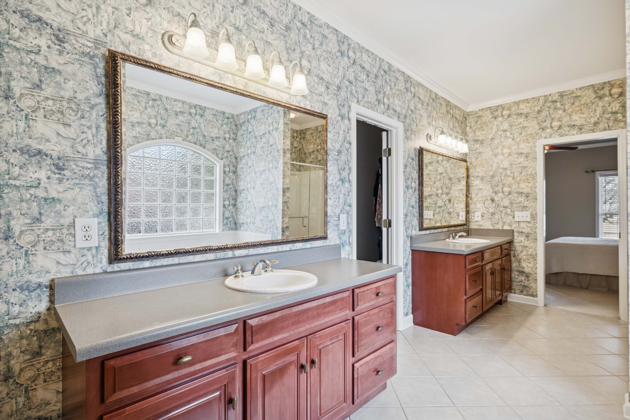 1205 Rock Springs Road Smyrna, TN 37167 - Photo 20 of 48 a spacious bathroom with a granite countertop tub sink and mirror