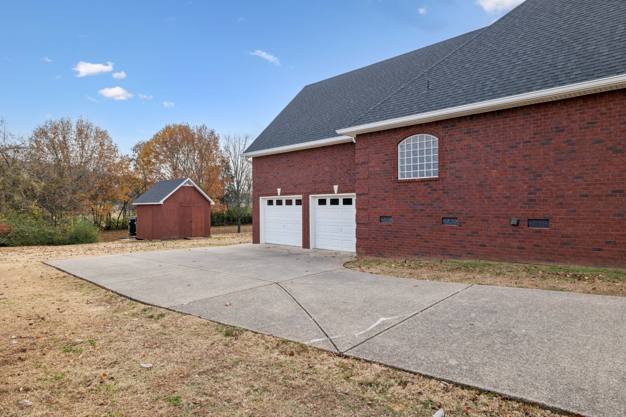 1205 Rock Springs Road Smyrna, TN 37167 - Photo 31 of 48 a front view of a house with a yard and garage