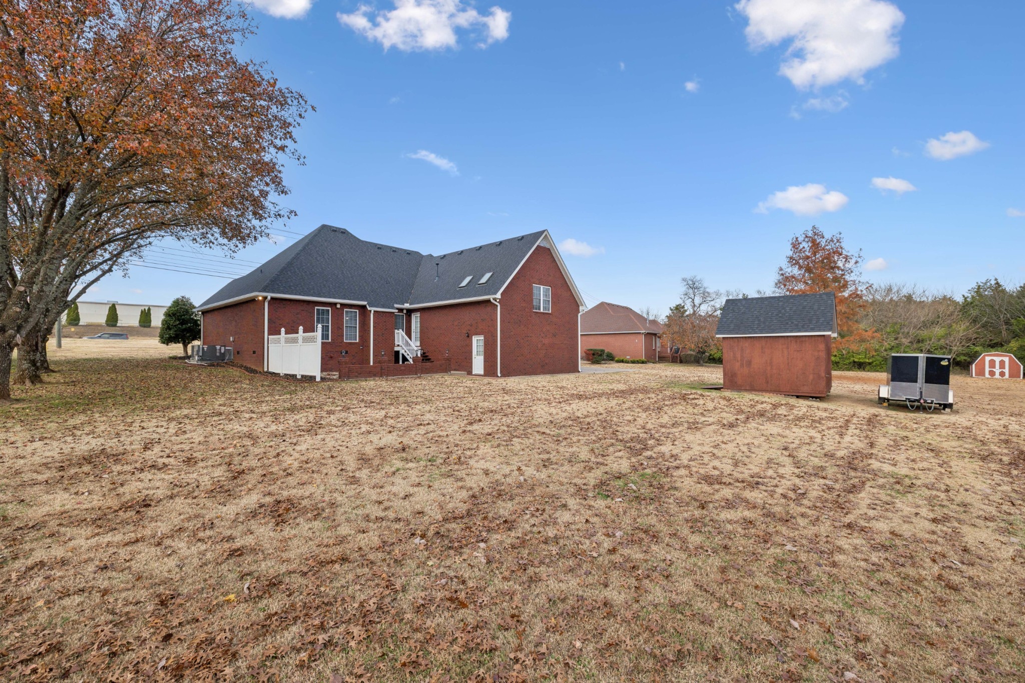 1205 Rock Springs Road Smyrna, TN 37167 - Photo 34 of 48 a front view of a house with a yard and garage