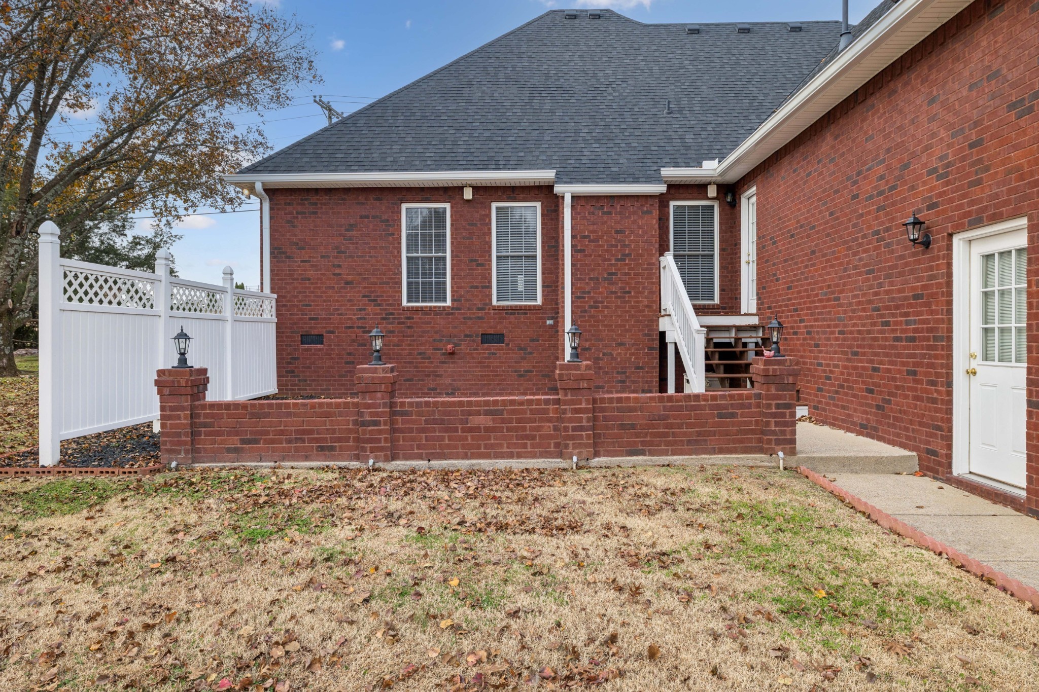 1205 Rock Springs Road Smyrna, TN 37167 - Photo 35 of 48 a view of a house with backyard and wooden fence