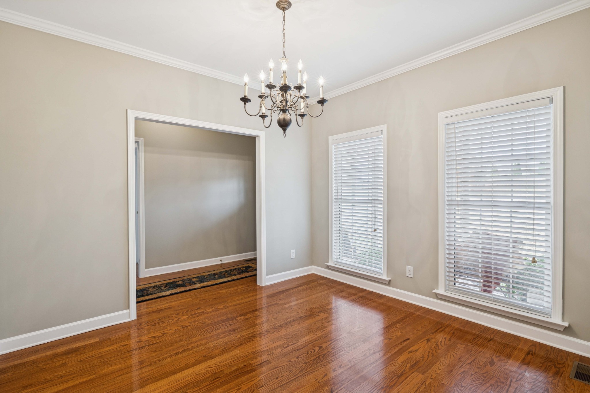 1205 Rock Springs Road Smyrna, TN 37167 - Photo 10 of 48 a view of an empty room with window and wooden floor
