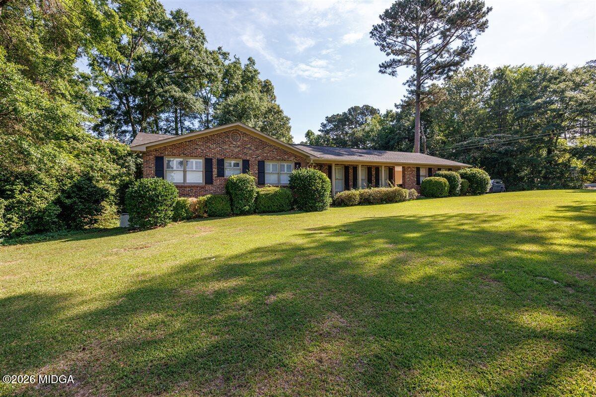 335 Hamrick Road Macon, GA 31220 - Photo 2 of 41 a house view with a garden space