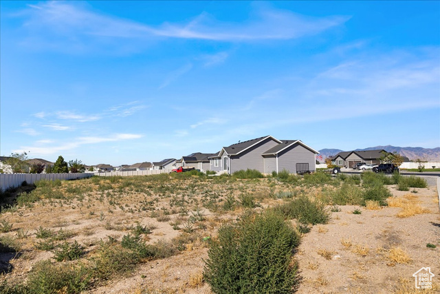 464 South Trejo Rdg Road Grantsville, UT 84029 - Photo 25 of 33 View of yard with a residential view and a mountain view