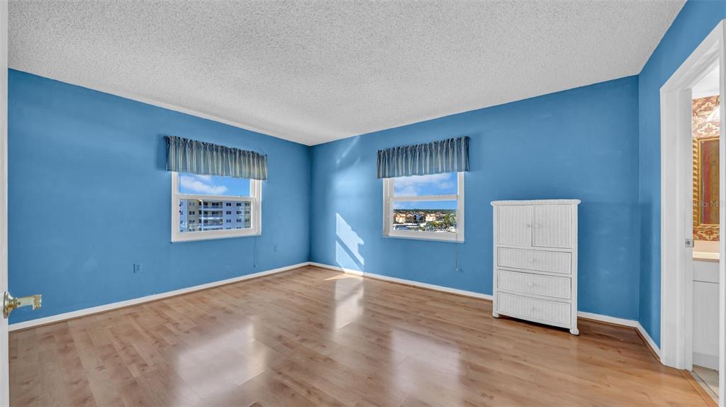 17400 Gulf Boulevard, Unit J7 Redington Shores, FL 33708 - Photo 23 of 32 a view of a room with a window and wooden floor