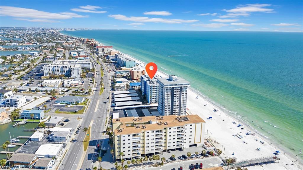 17400 Gulf Boulevard, Unit J7 Redington Shores, FL 33708 - Photo 4 of 32 a city view with tall buildings
