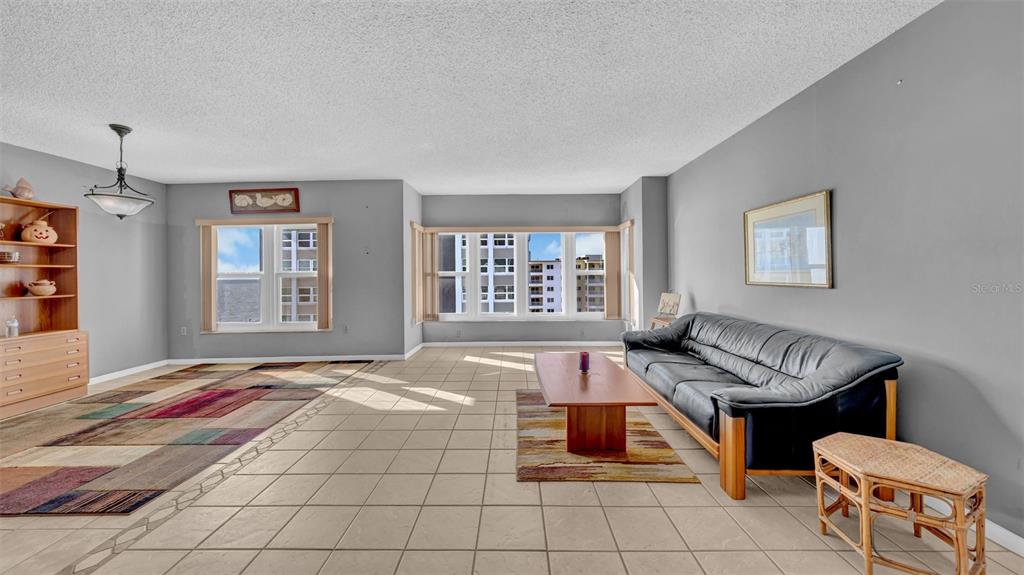 17400 Gulf Boulevard, Unit J7 Redington Shores, FL 33708 - Photo 8 of 32 a living room with furniture and window