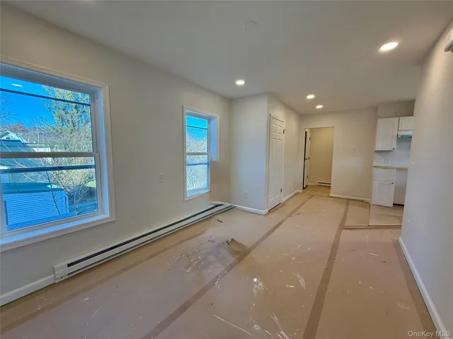 a view of an entryway with a livingroom