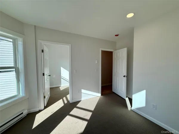 a view of a balcony with a floor to ceiling window