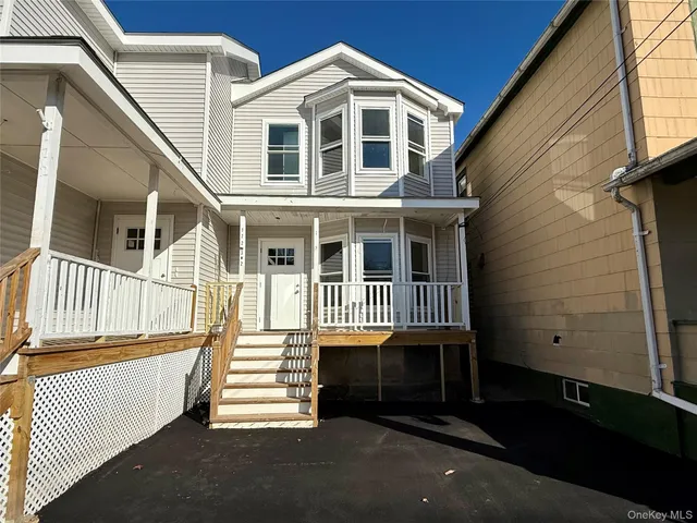 a view of a house with a deck