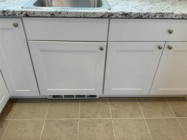 a bathroom with a toilet a sink and bathtub