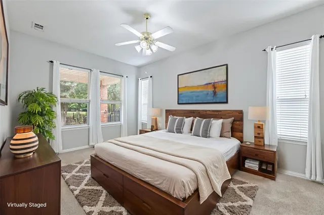 a view of house with backyard