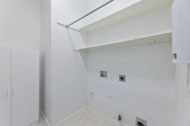a bathroom with a shower sink vanity mirror and toilet
