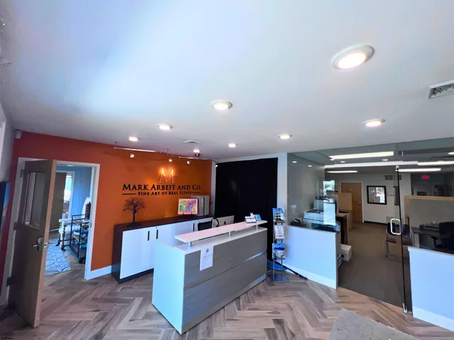 a view of kitchen with kitchen island granite countertop a stove top oven
