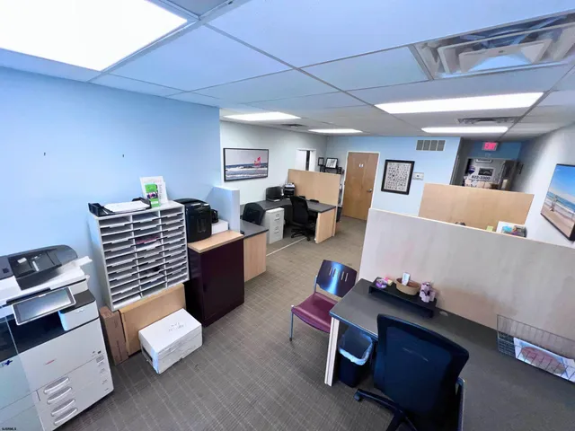 a room with furniture and a wooden floor