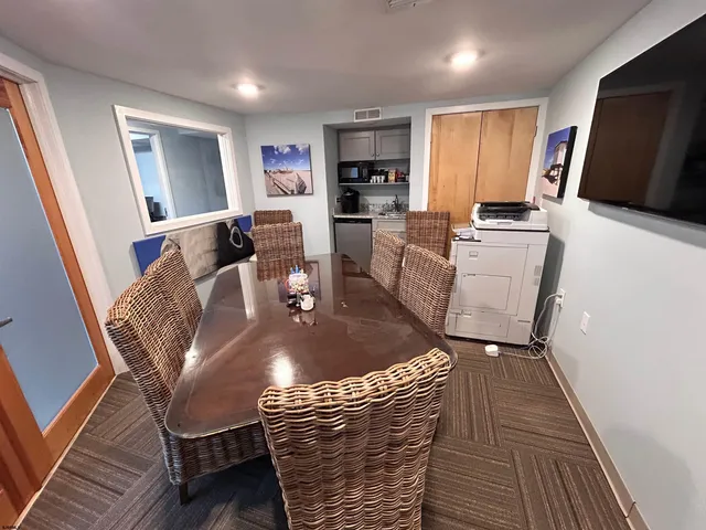 a view of a dining room with furniture