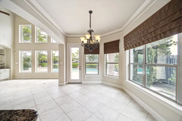 a kitchen with a sink stove and refrigerator
