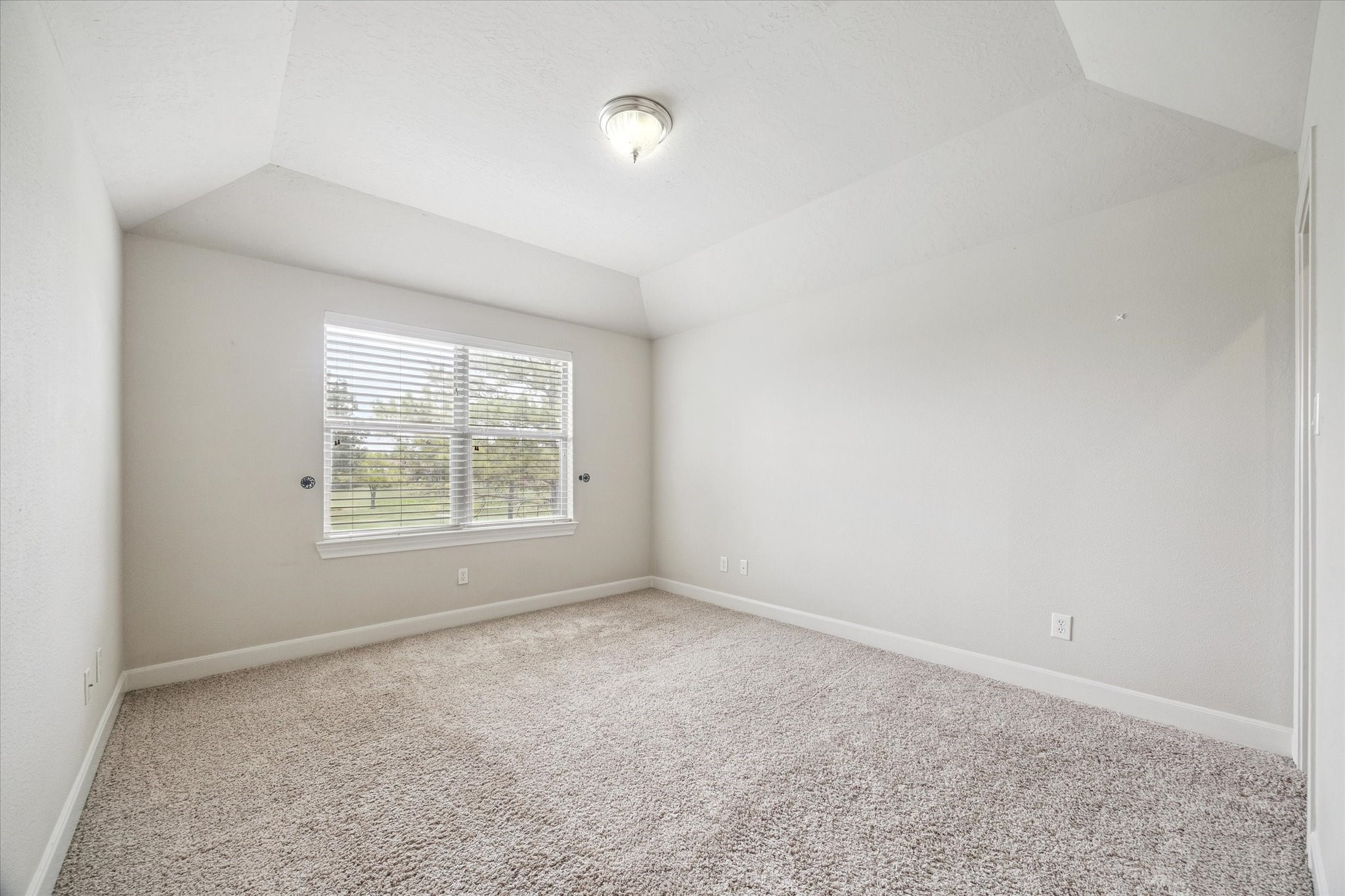 3327 Louvre Lane Houston, TX 77082 - Photo 21 of 31 an empty room with a window