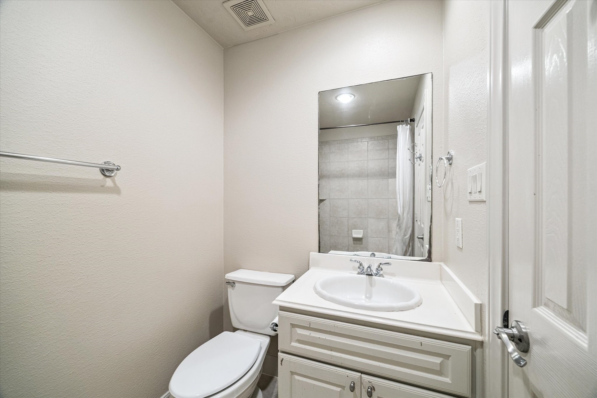 3327 Louvre Lane Houston, TX 77082 - Photo 22 of 31 a bathroom with a sink toilet and shower