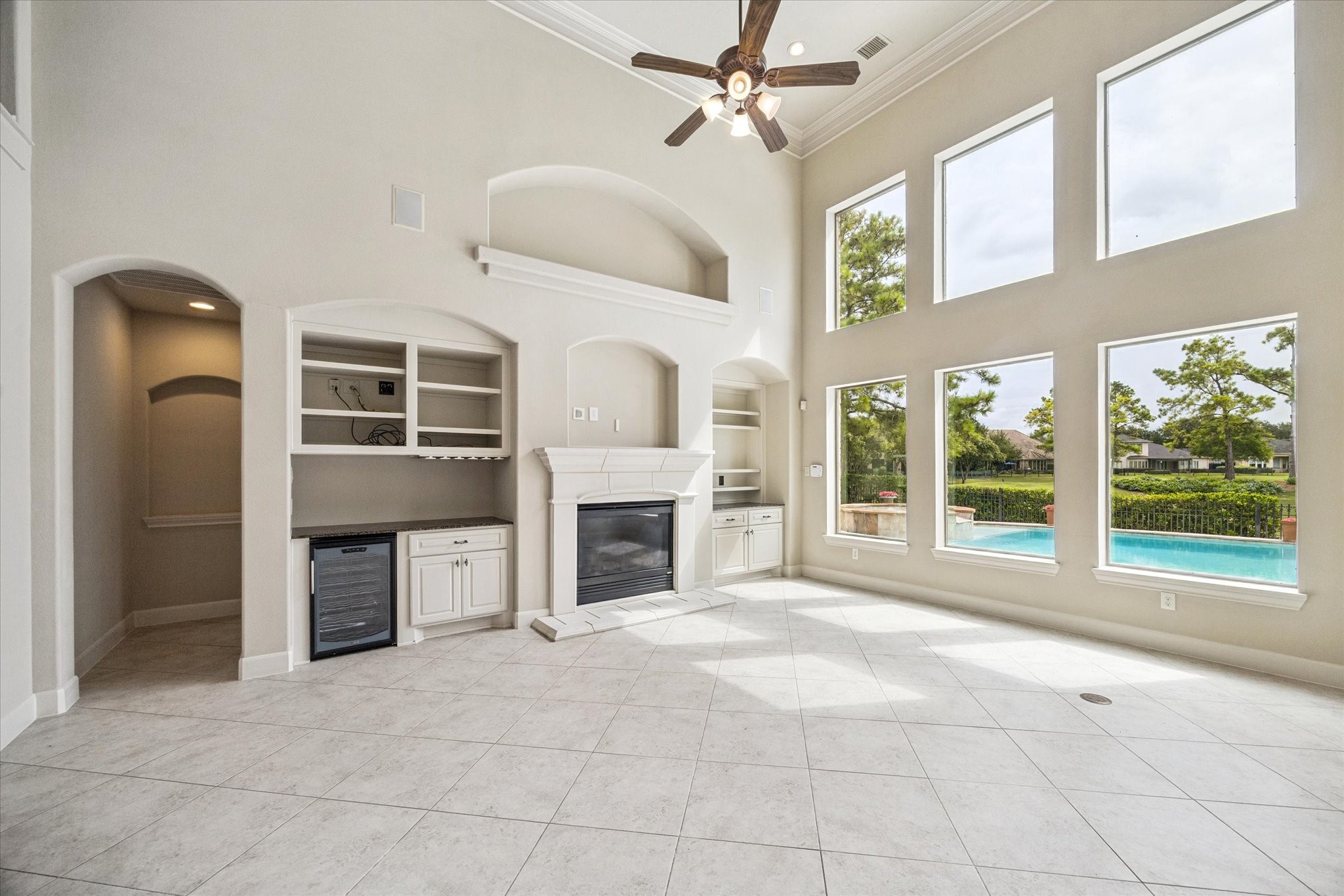 3327 Louvre Lane Houston, TX 77082 - Photo 9 of 31 a view of an empty room with a fireplace and a window