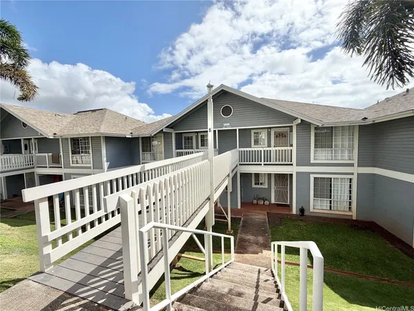 a view of a house with a roof deck
