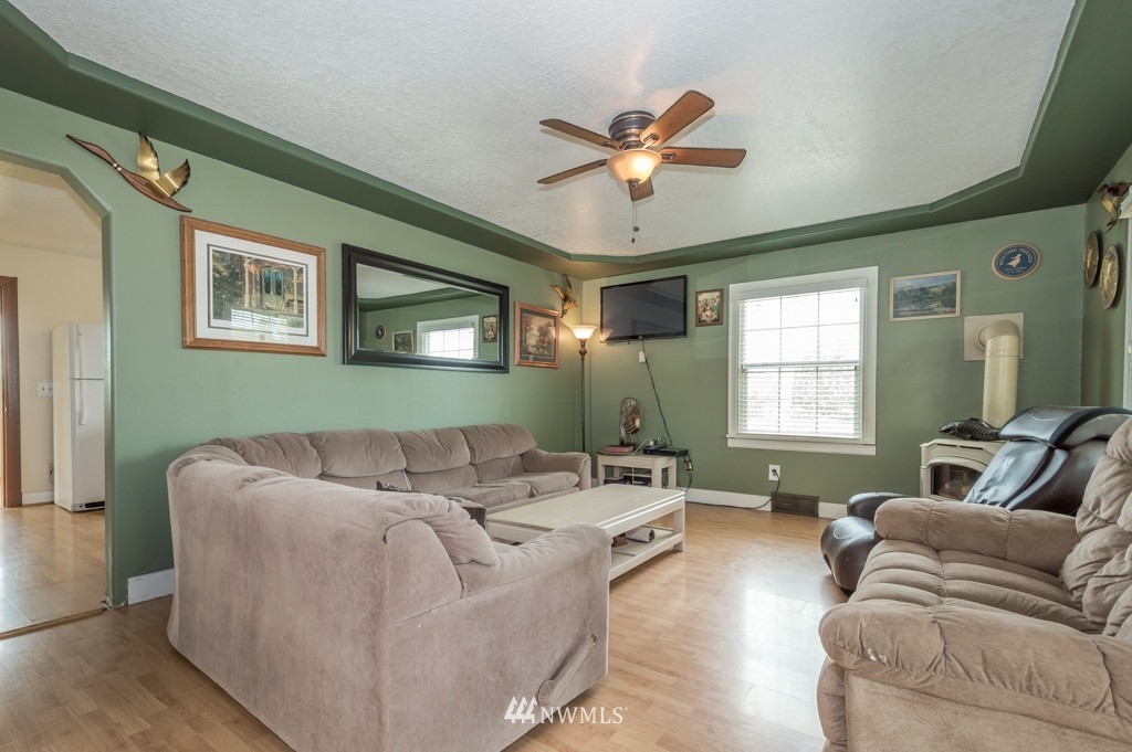 347 Newaukum Valley Road Chehalis, WA 98532 - Photo 10 of 25 a living room with furniture and a large window