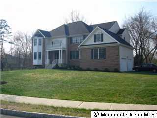 9 Mehar Court Jackson, NJ 08527 - Photo 1 of 3 a view of a big house with a big yard and large trees