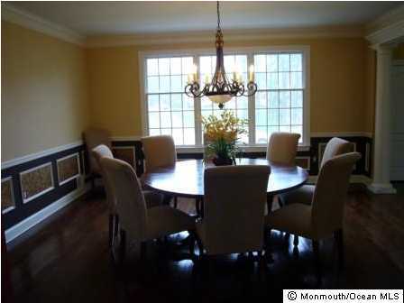 9 Mehar Court Jackson, NJ 08527 - Photo 2 of 3 a view of a dining room with furniture window and outside view