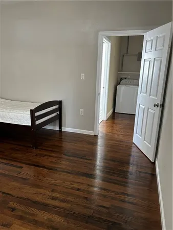 a bathroom with a toilet and a bathtub