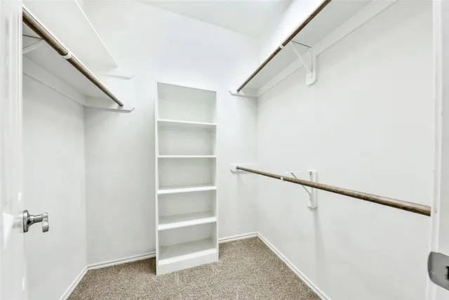 a view of an empty walk in closet
