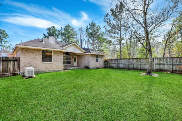 a view of a yard with a house and garden