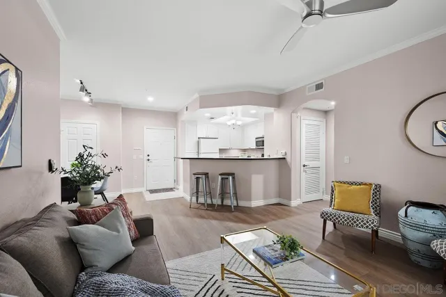a view of a dining room with furniture and window