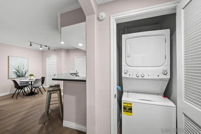 a kitchen with a table and chairs in it