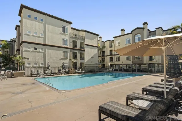 a view of a room with kitchen view and a living room