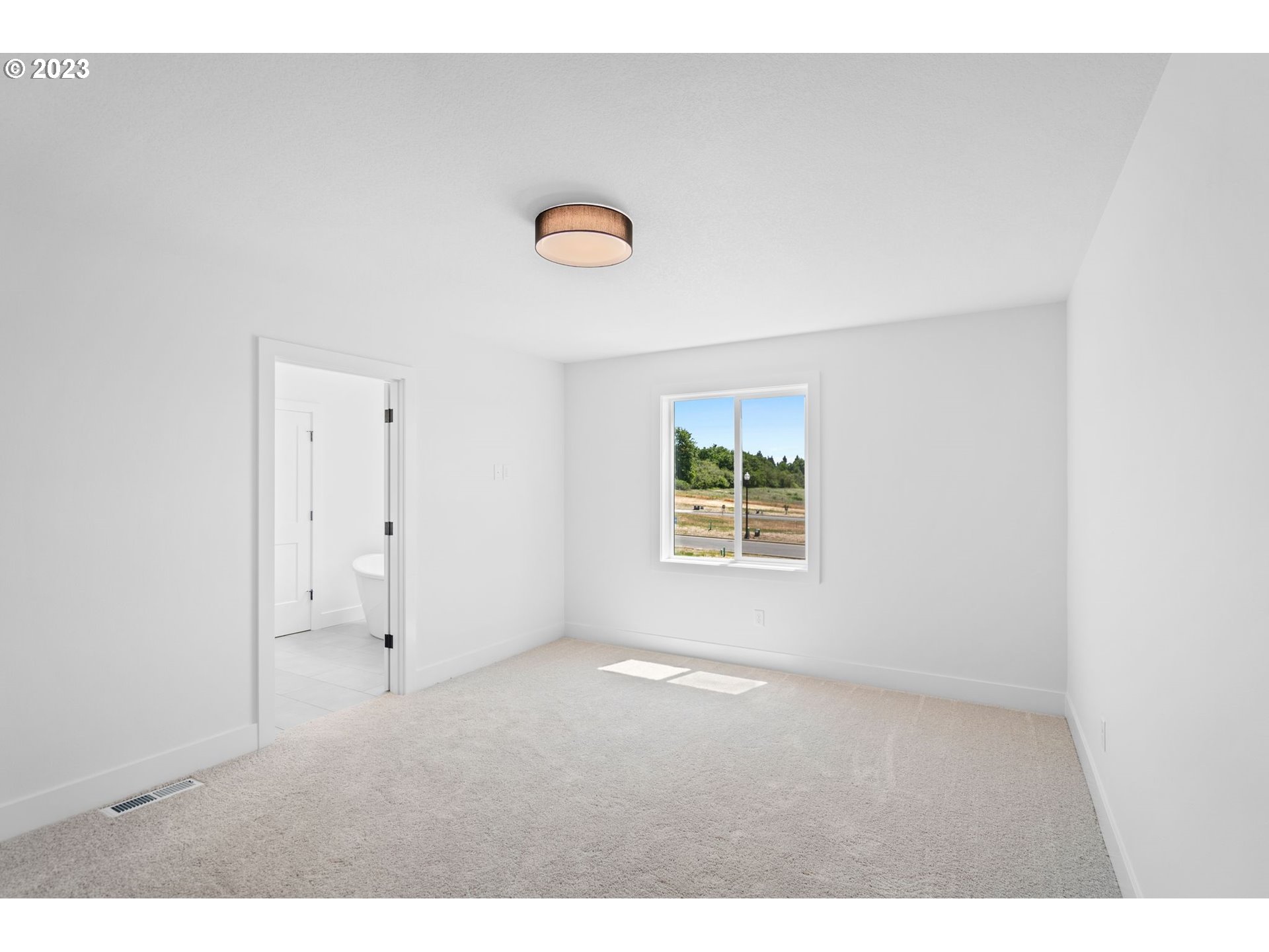 719 Northwest 175th Way Ridgefield, WA 98642 - Photo 24 of 33 a view of an empty room with a window