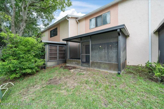 a house with trees in front of it