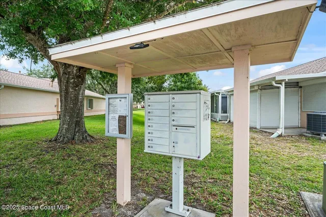 a view of a back yard of the house