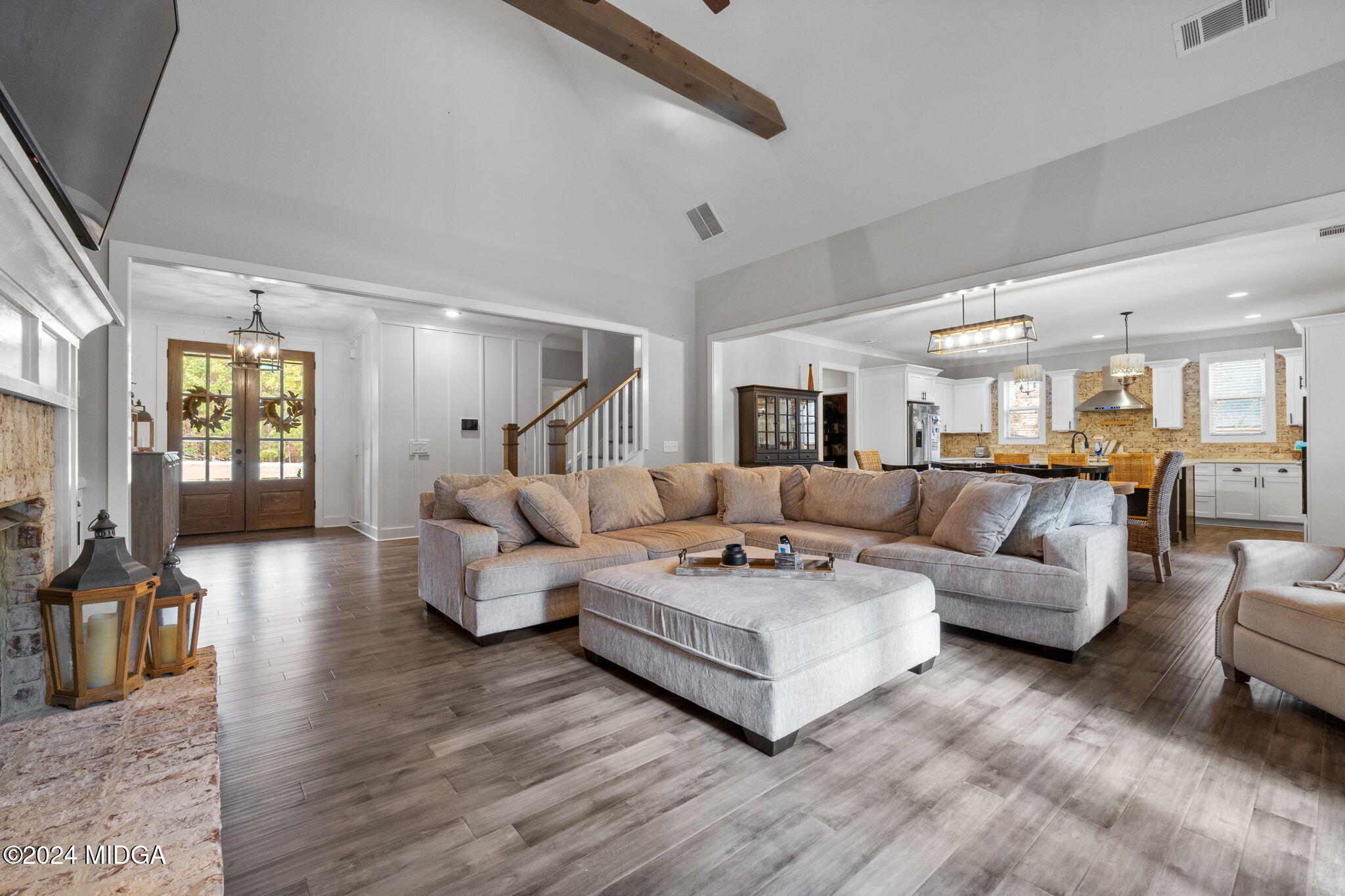 131 Belmont Way Forsyth, GA 31029 - Photo 13 of 68 a living room with furniture and wooden floor