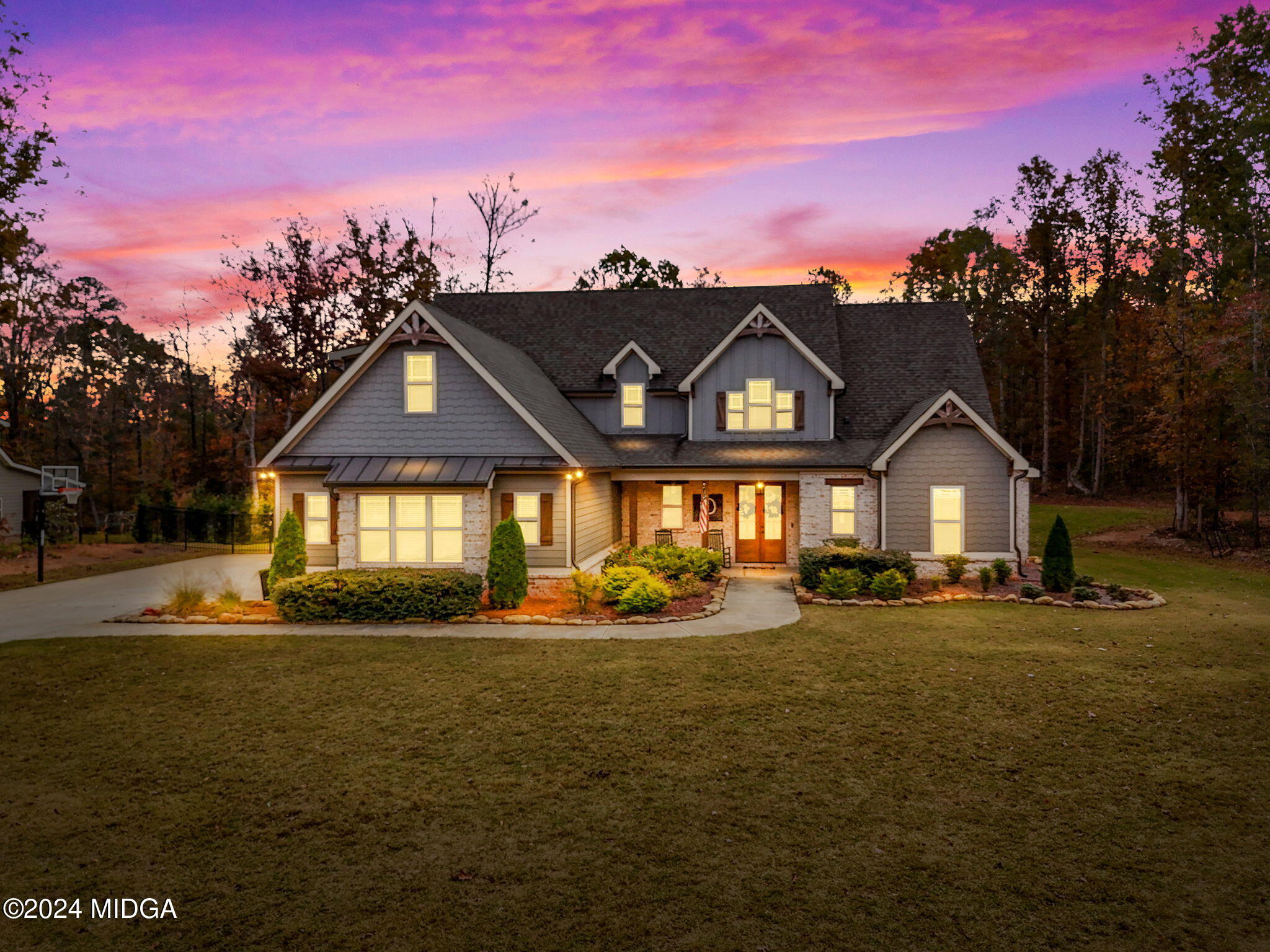 131 Belmont Way Forsyth, GA 31029 - Photo 2 of 68 a front view of a house with a yard